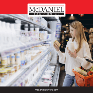 A woman checks the labels on products while shopping in a pharmacy in Jonesboro
